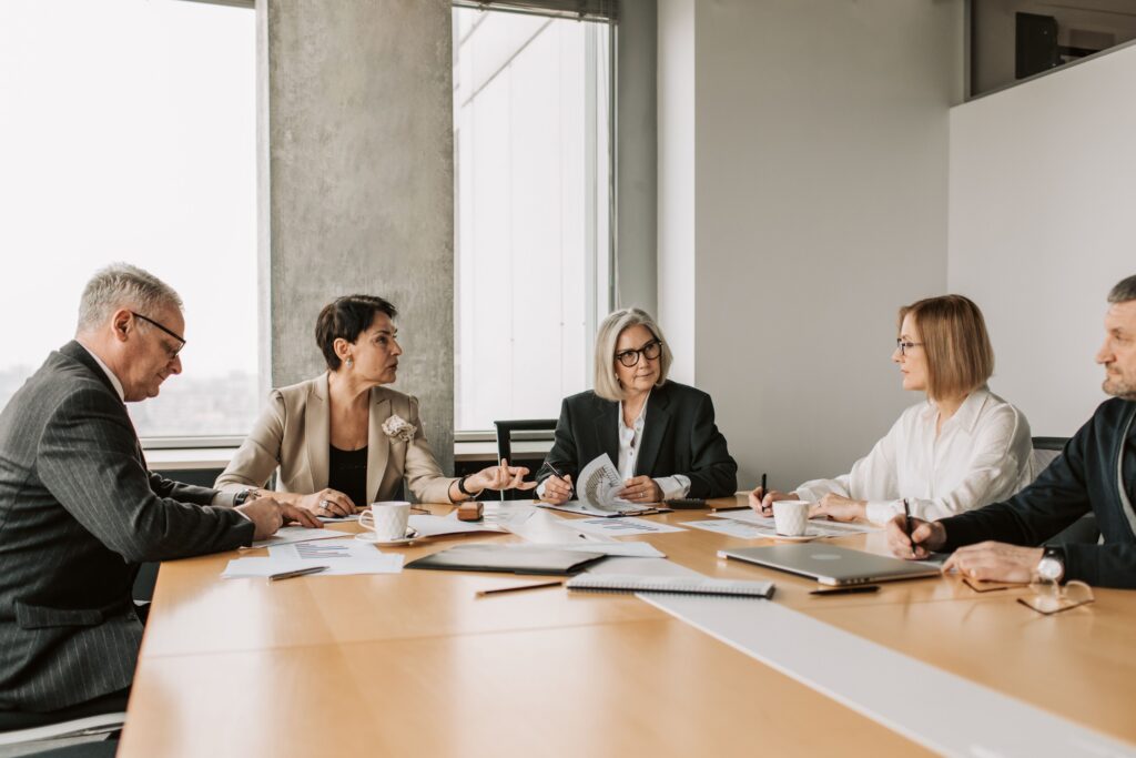 A group of people in a meeting.
